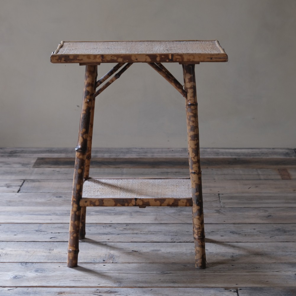 A 2 tier bamboo and rattan side table View II