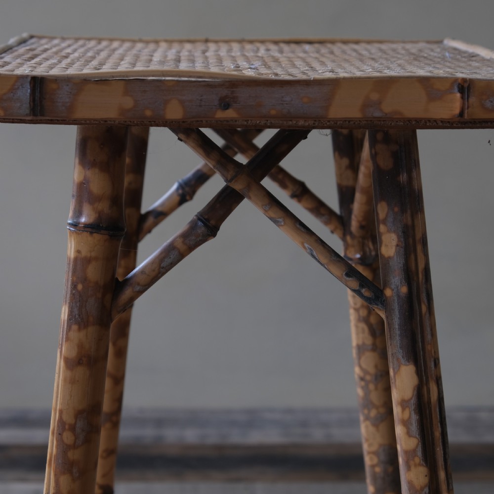 A 2 tier bamboo and rattan side table View VI