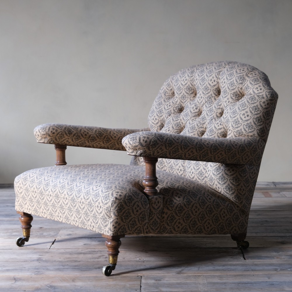 19th century Howard and sons open armchair c1860