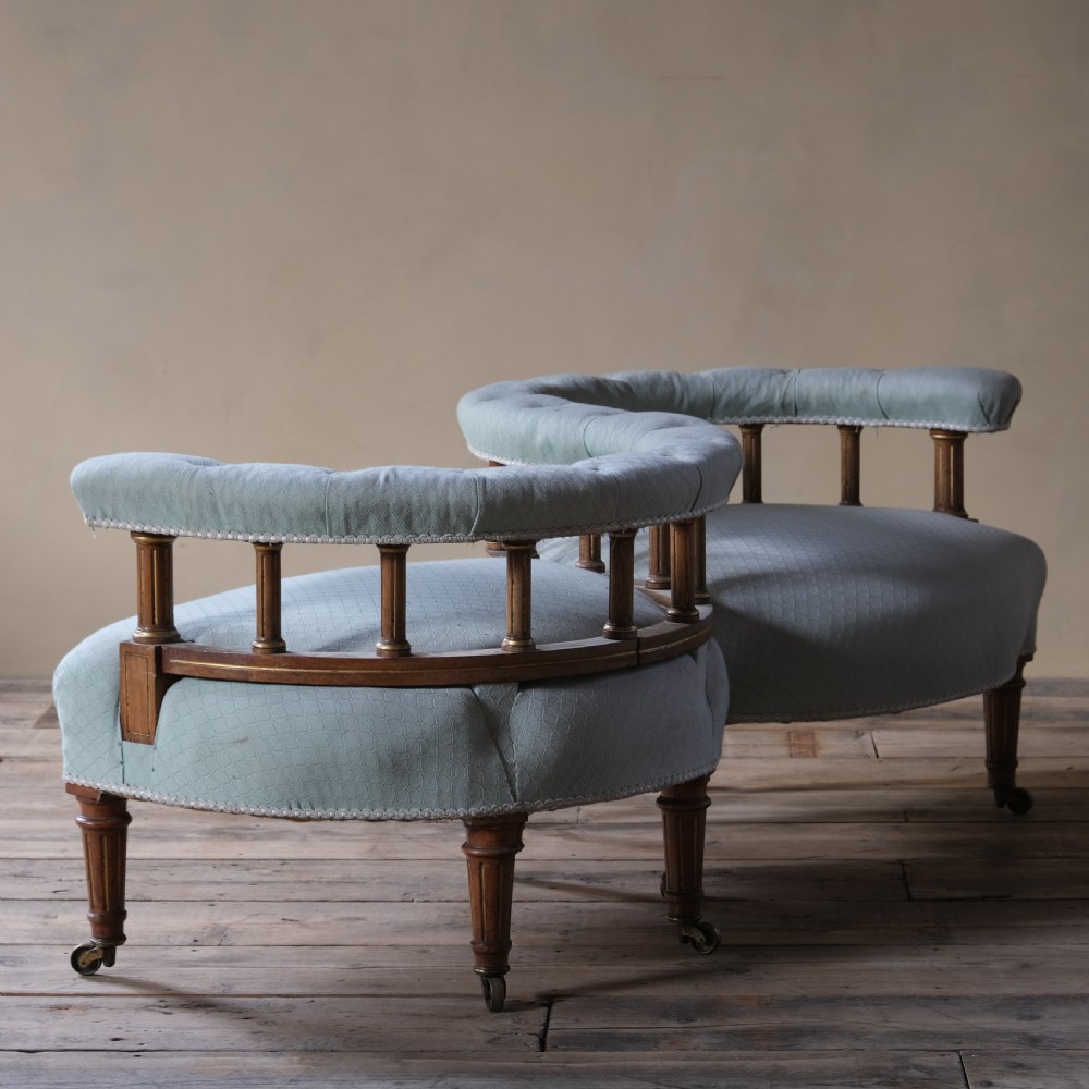 A petite 19th century walnut conversation sofa almost certainly by Gillows View IV