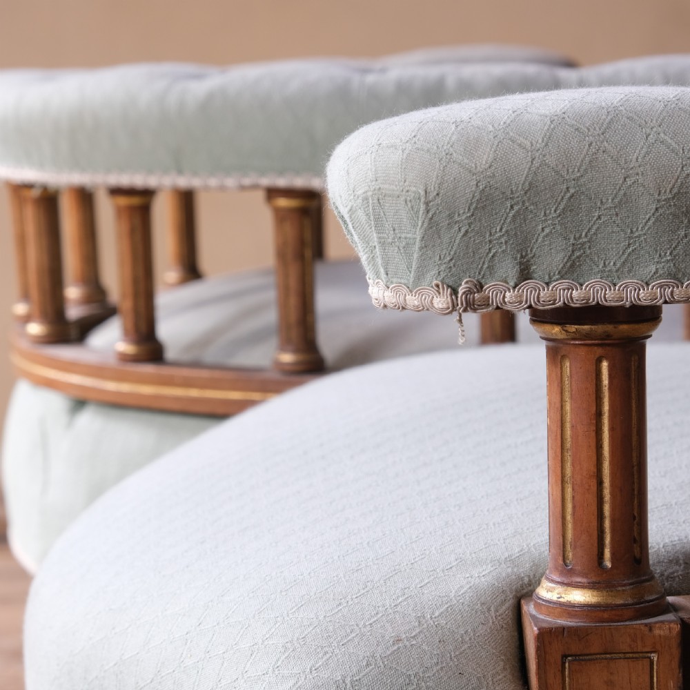 A petite 19th century walnut conversation sofa almost certainly by Gillows View VII