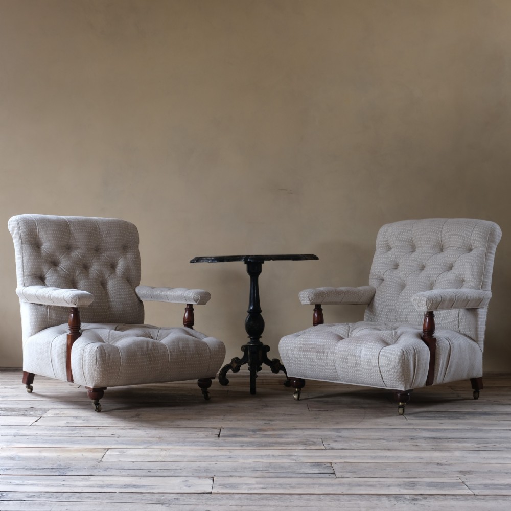 A pair of 19th century fully buttoned open armchairs View II