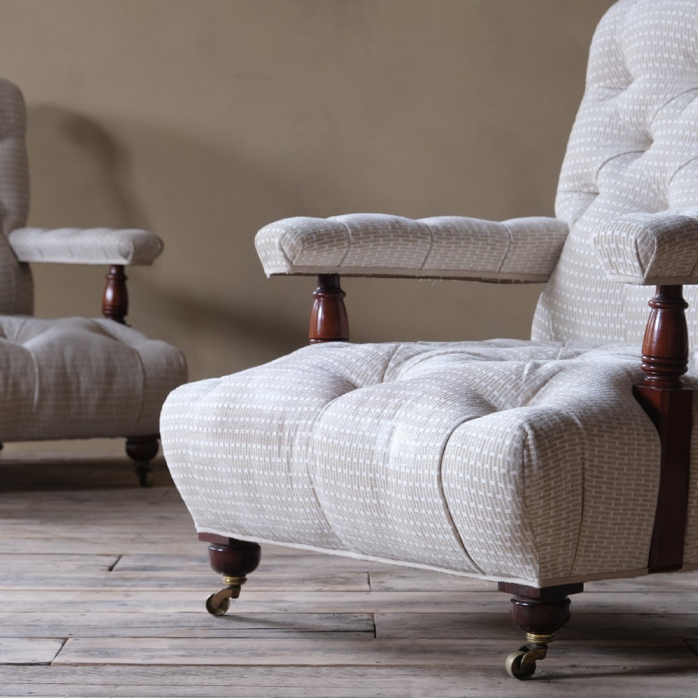 A pair of 19th century fully buttoned open armchairs View IV