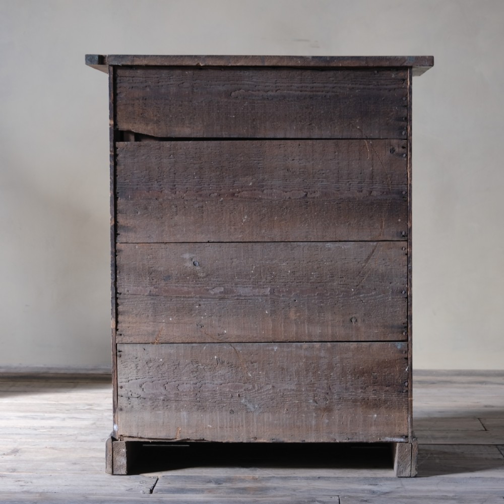 A small 19th century grained pine chest of drawers View XI