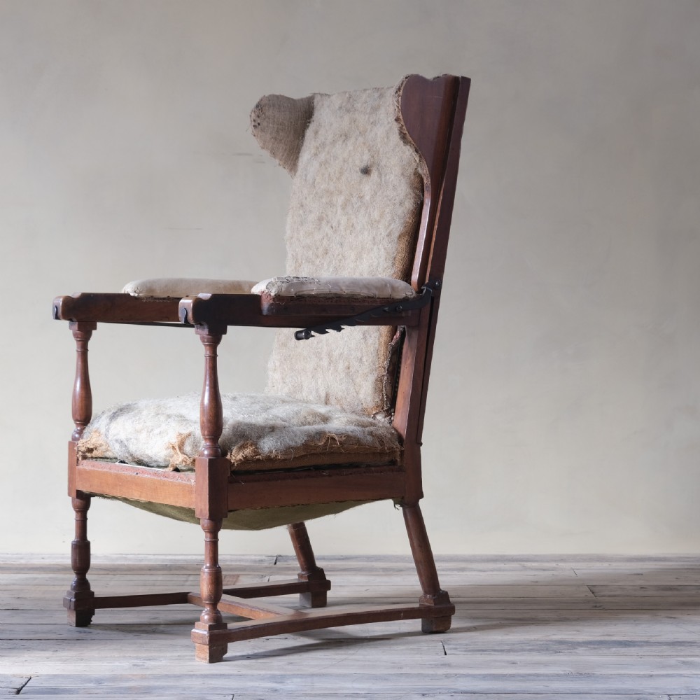 19th century French walnut reclining wingback armchair View II