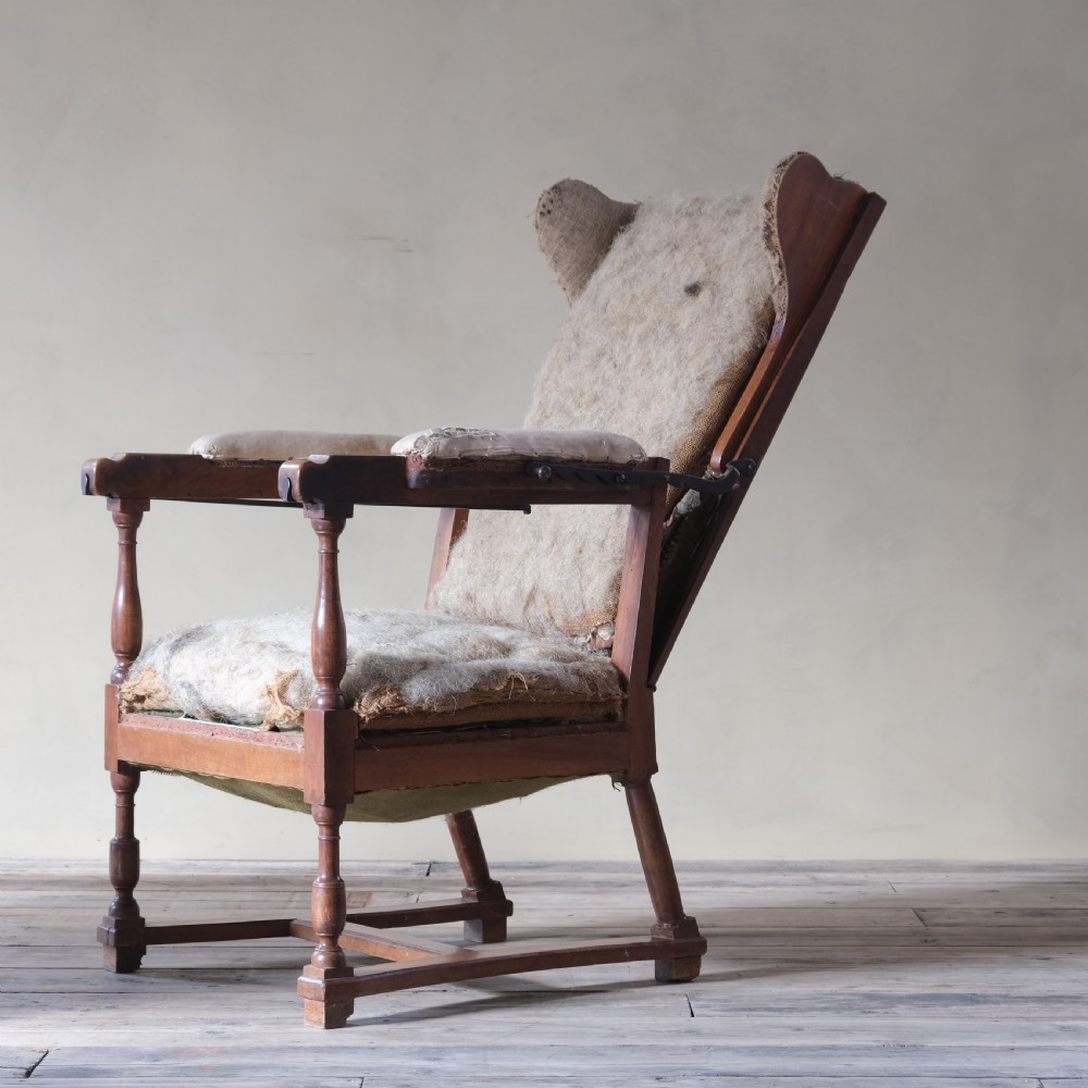 19th century French walnut reclining wingback armchair View V