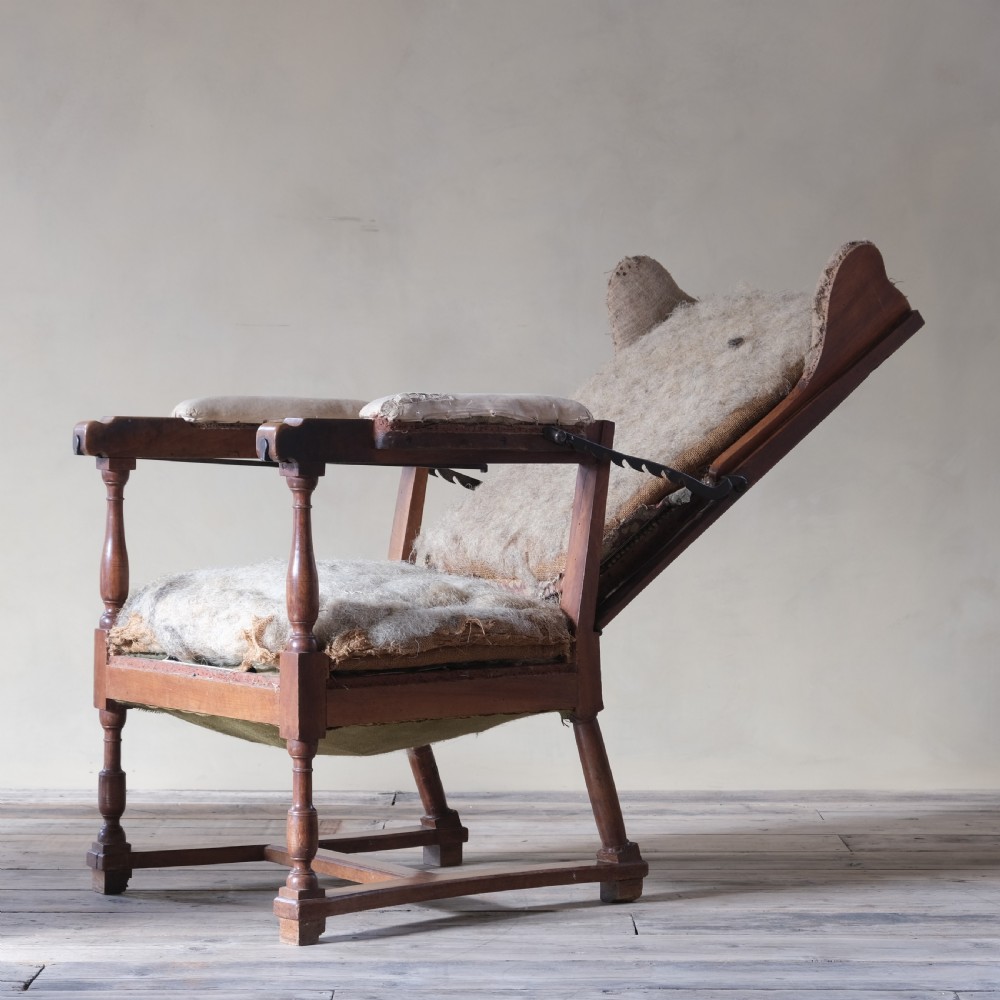 19th century French walnut reclining wingback armchair View IX