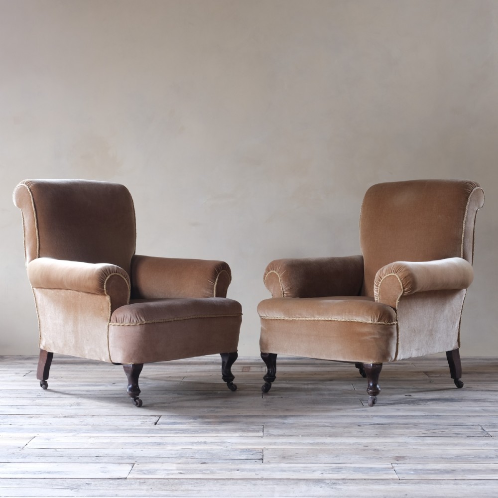 pair of antique country house armchairs