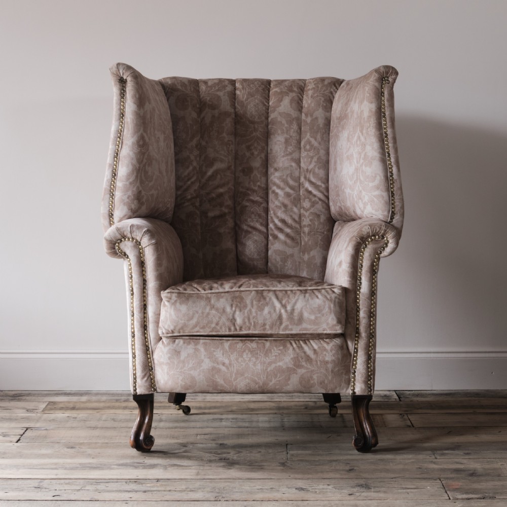 Large antique barrel back porters armchair
