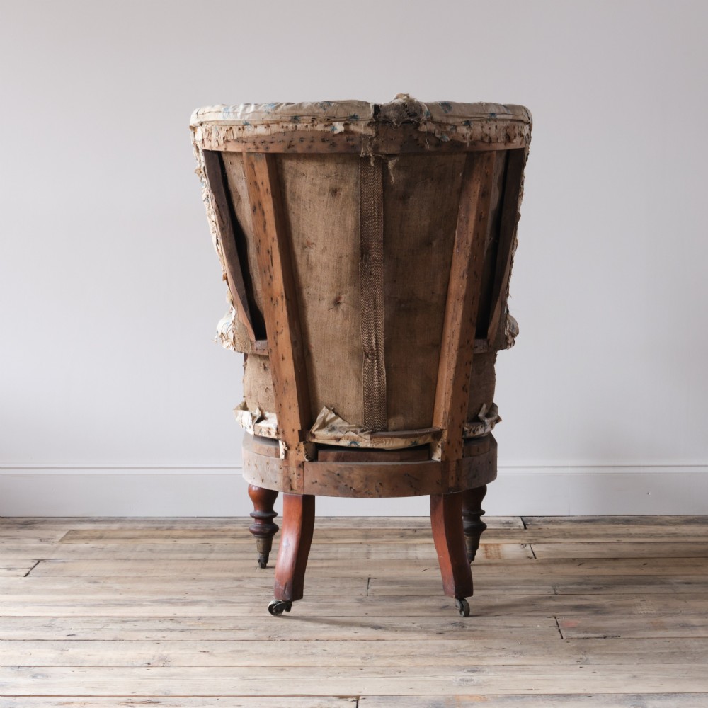 An early 19th century barrel back armchair View VI