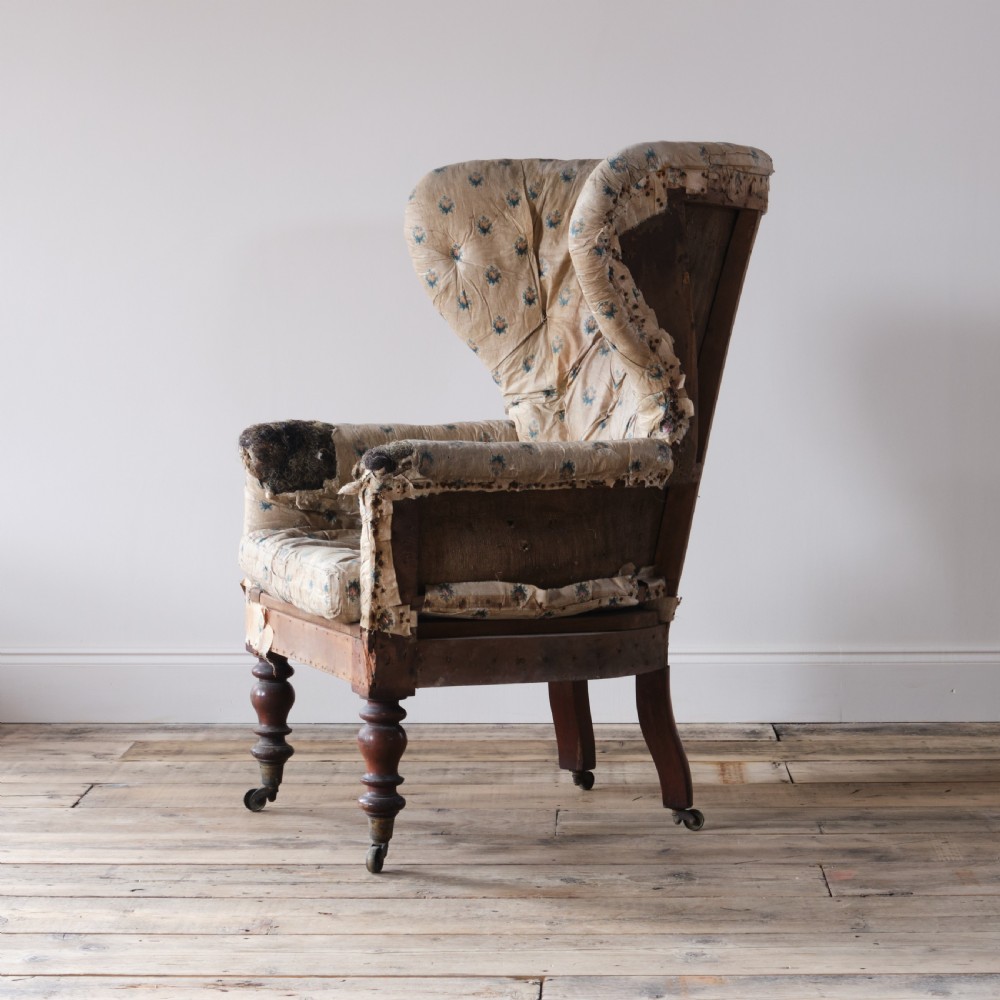 An early 19th century barrel back armchair View VII