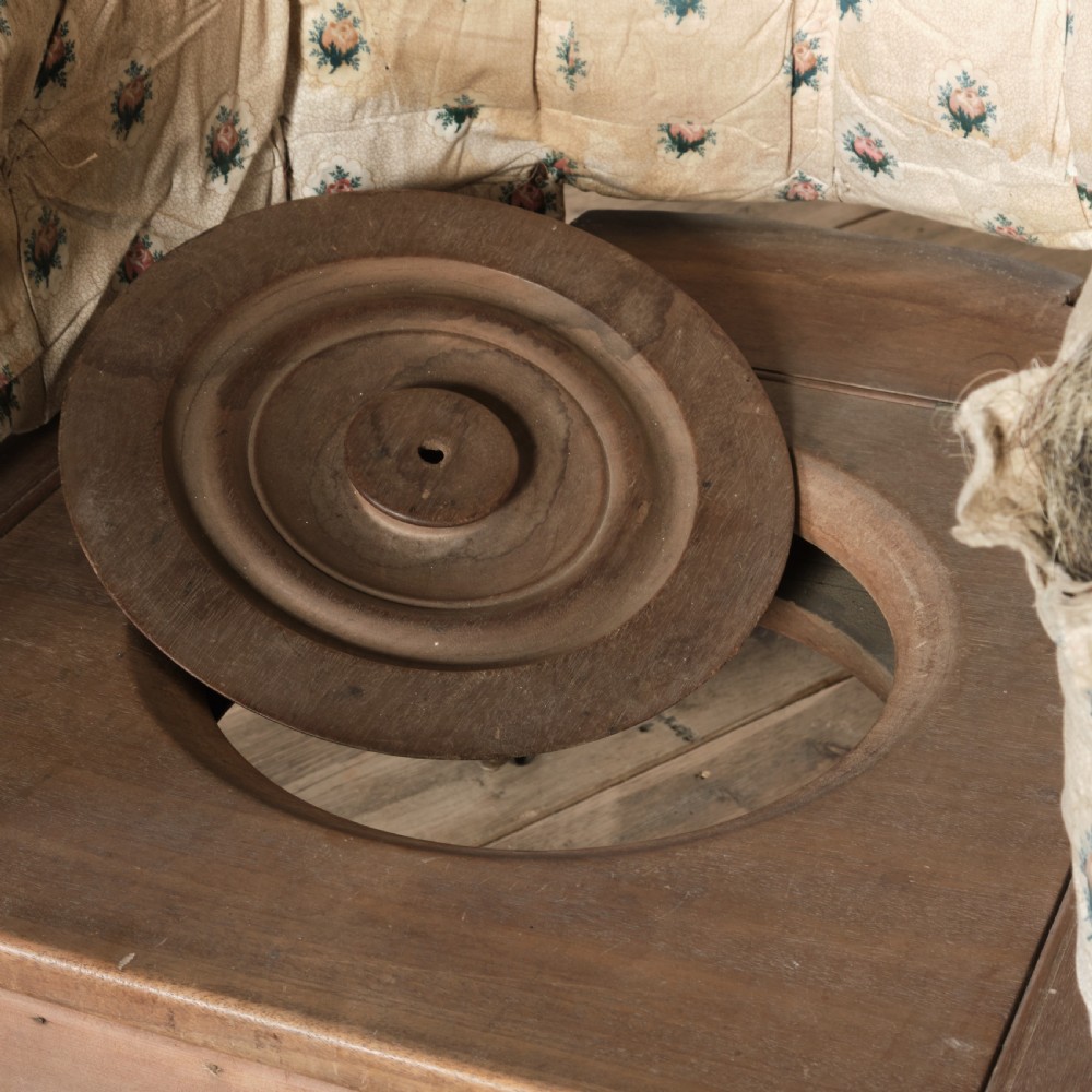 An early 19th century barrel back armchair View IX