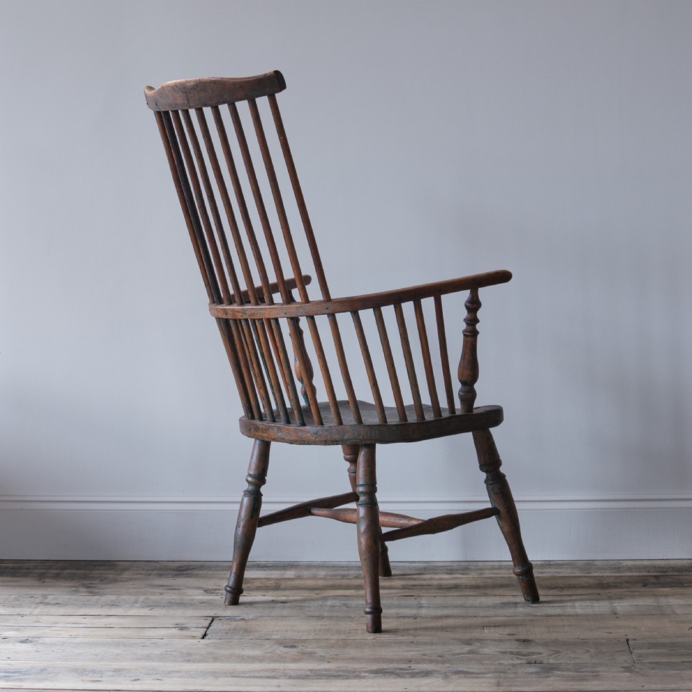 Primitive ash and elm comb back Windsor chair View IV