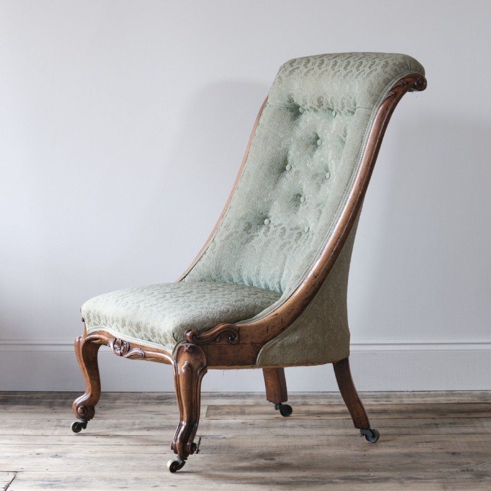 19th century carved walnut slipper chair
