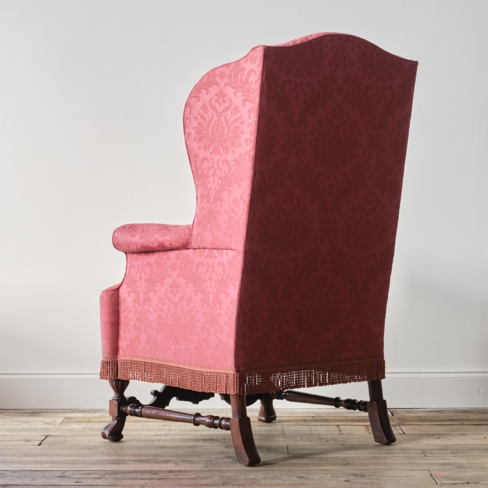 Large William & Mary style wingback armchair. View IV