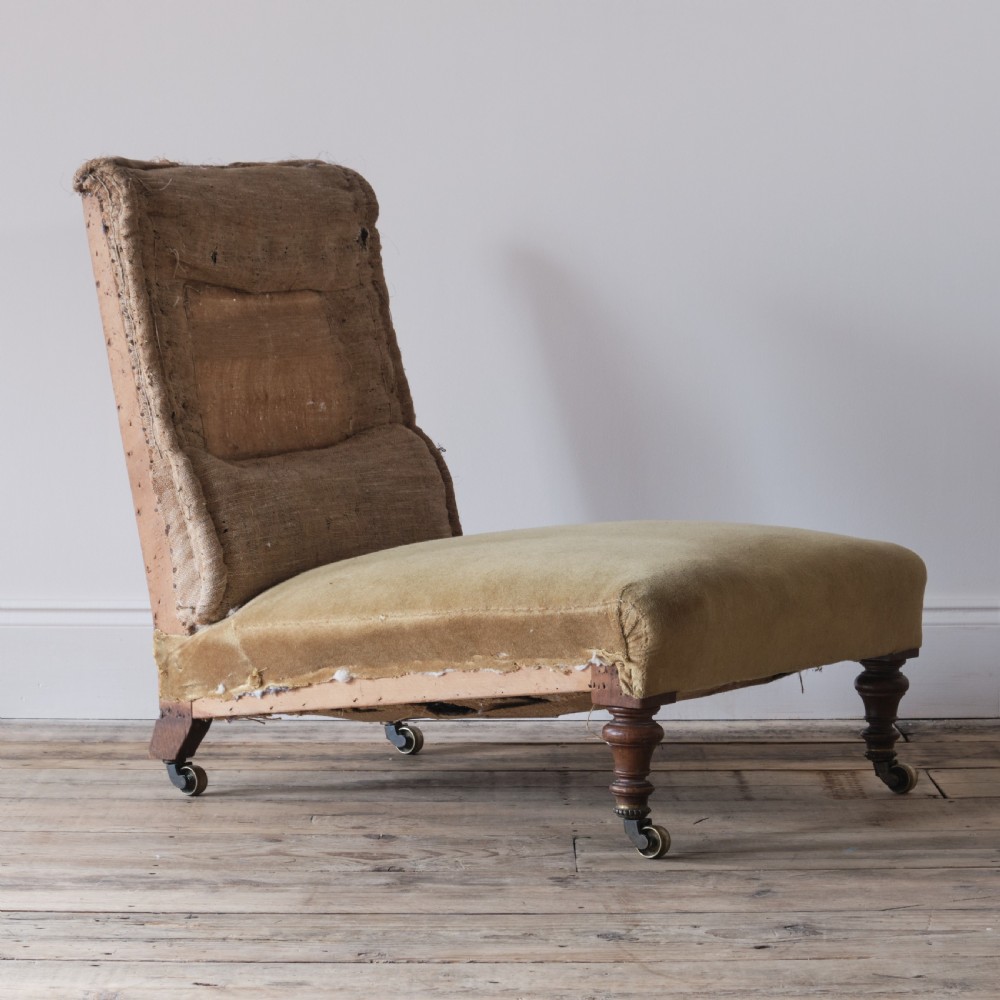 Low deep seated 19th century Howard style slipper chair View III