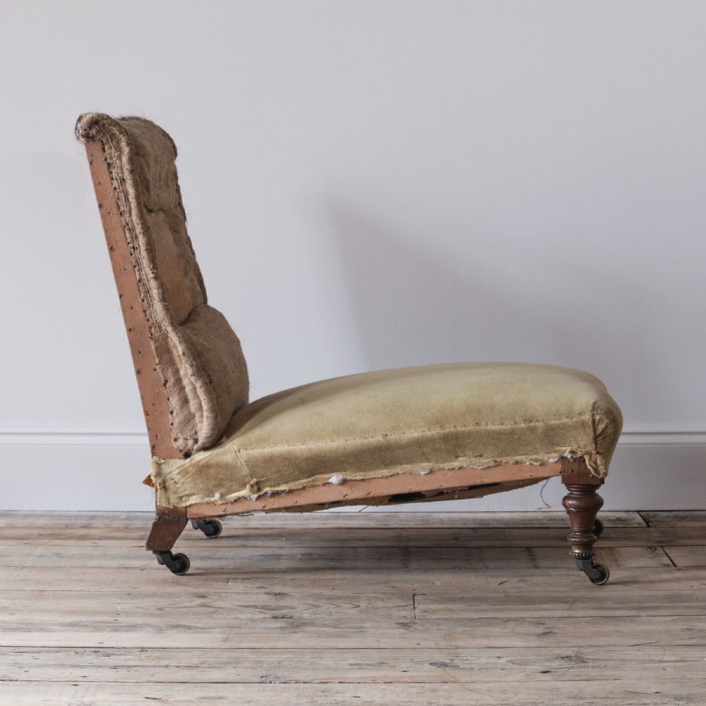 Low deep seated 19th century Howard style slipper chair View IV