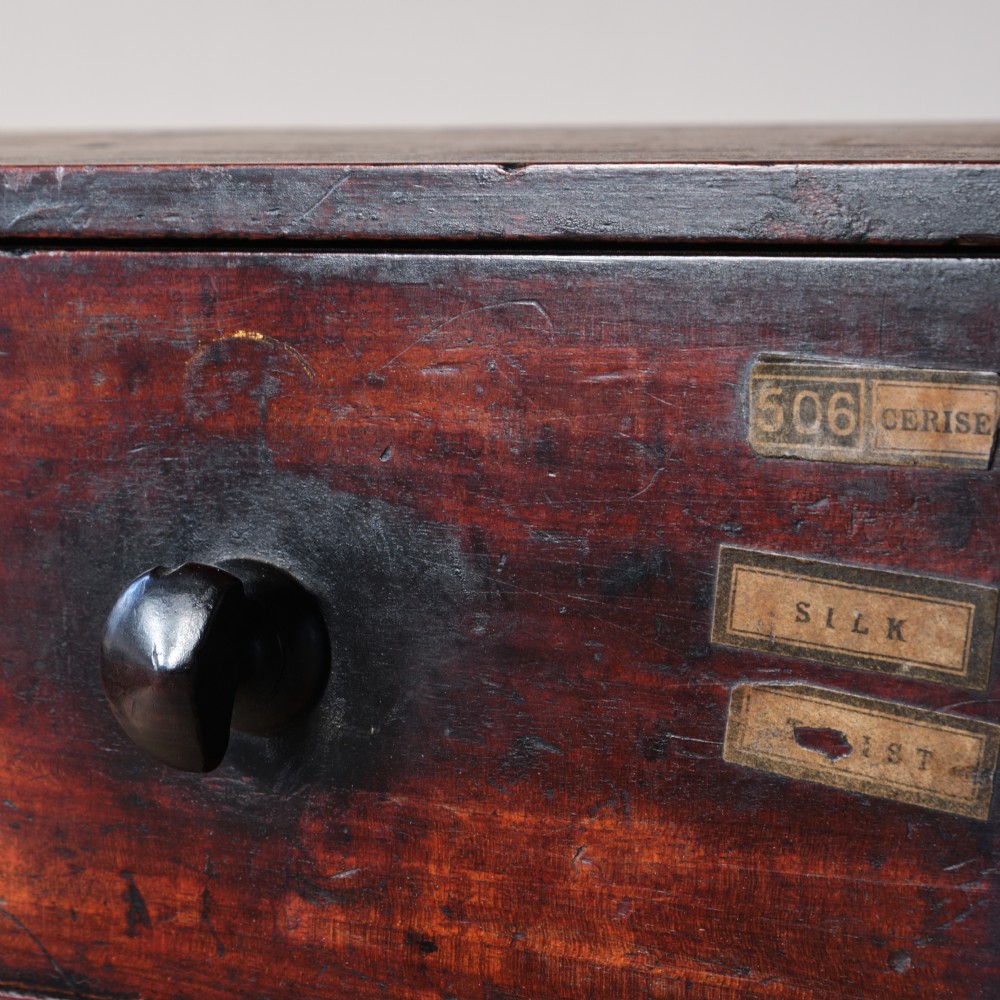 19th century mahogany bank of 16 worktop apothecary drawers View V