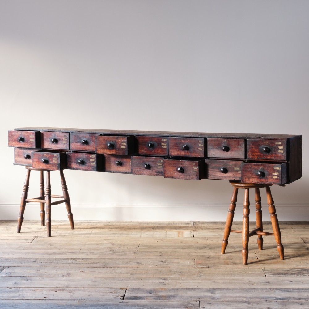 19th century mahogany bank of 16 worktop apothecary drawers