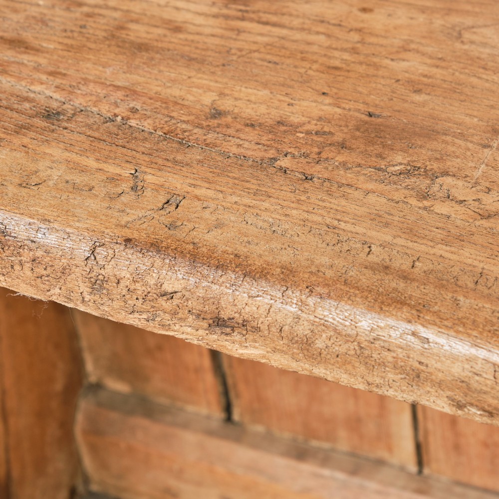 A 19th-century pine and elm high-backed settle featuring scrolled armrests and vertical plank construction. View XIV