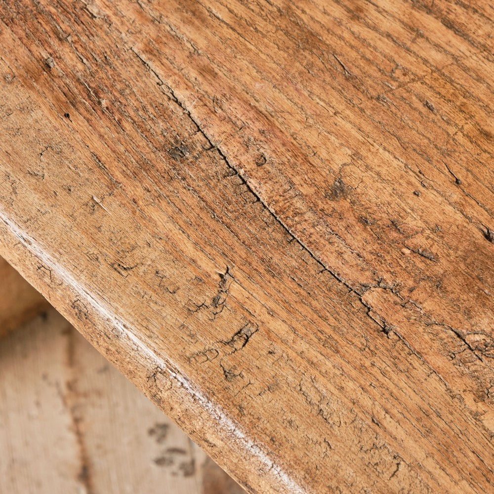 A 19th-century pine and elm high-backed settle featuring scrolled armrests and vertical plank construction. View XV