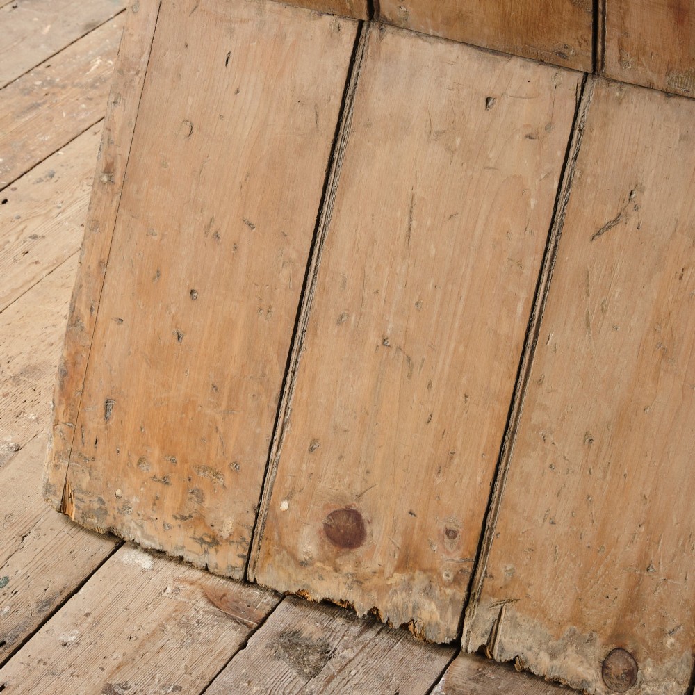 An early nineteenth-century Georgian pine high-backed settle featuring winged side panels and a planked box base. View XI