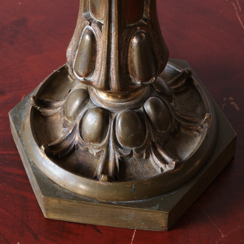 A 19th-century gilt brass table lamp base featuring a tapered central column, stylized foliage details, and an octagonal plinth base. View III