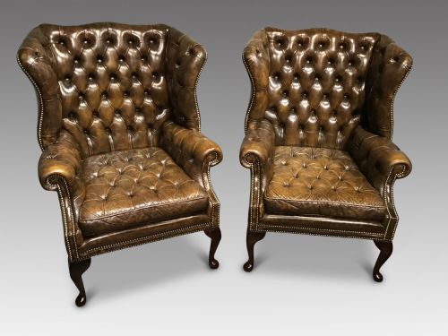 Pair of Leather Upholstered Wing Chairs