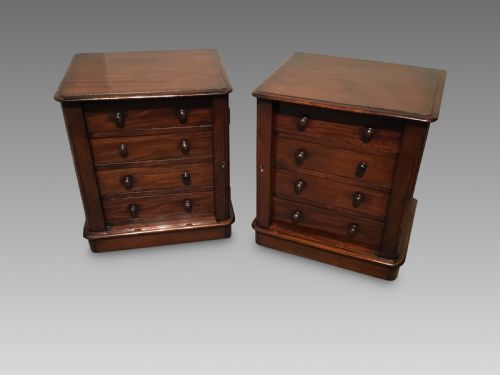 A Pair of Antique Mahogany Miniature Wellington Chests