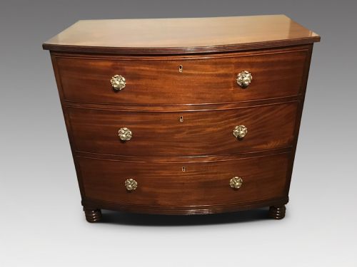 Antique Bow Chest of Drawers