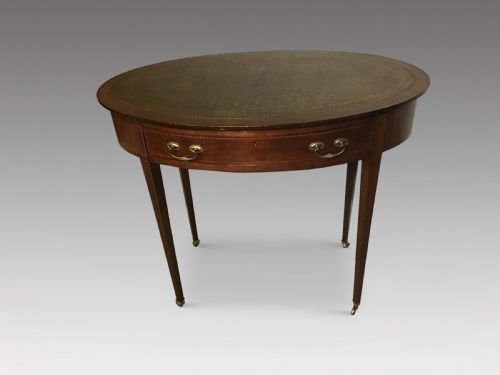 ANTIQUE OVAL WRITING TABLE