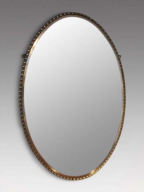 An Antique Brass Framed Mirror