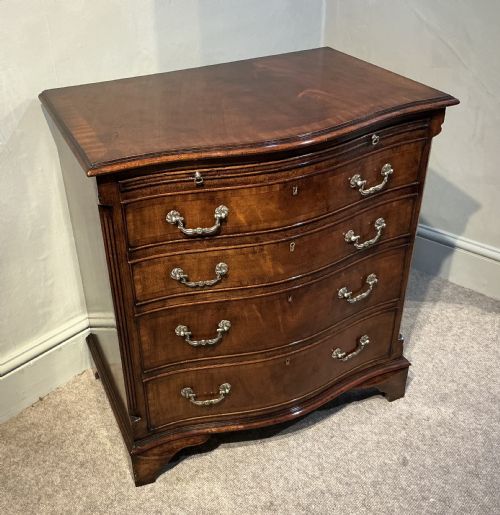 Mahogany serpentine chest of drawers