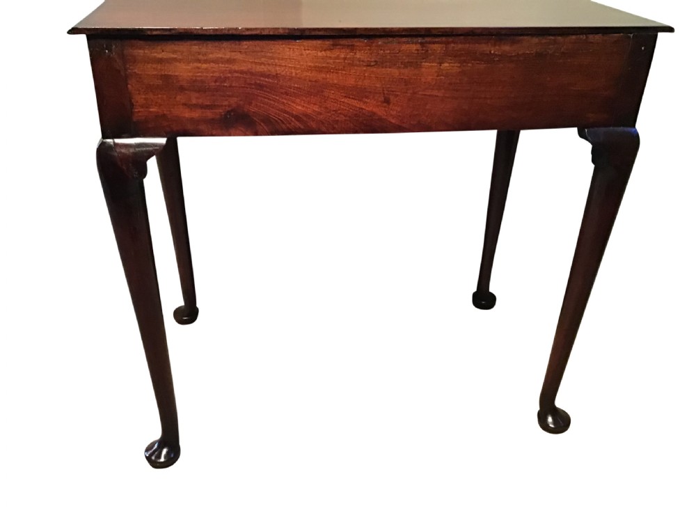 A Georgian mahogany side table featuring a single frieze drawer with a brass handle, supported by slender cabriole legs with pad feet. View V