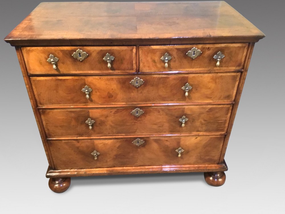 Antique walnut and oak chest of drawers