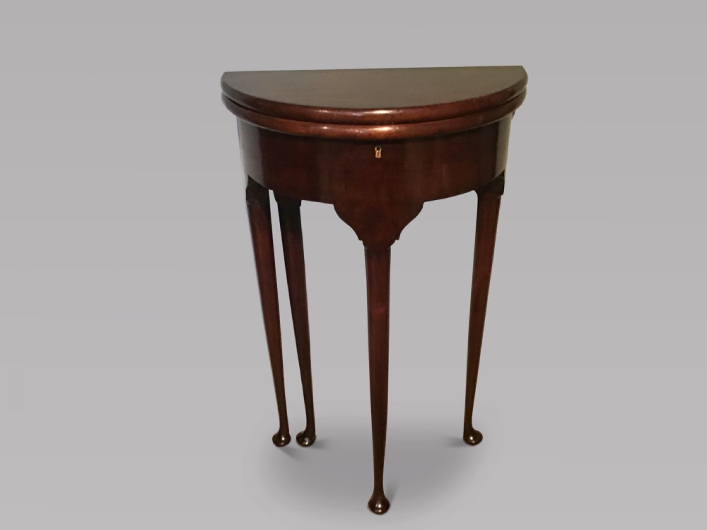Antique mahogany demi lune table