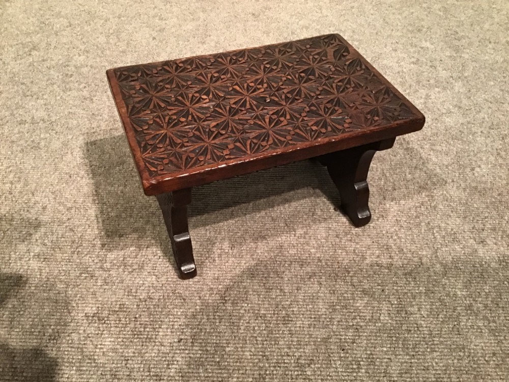 Antique chip carved stool
