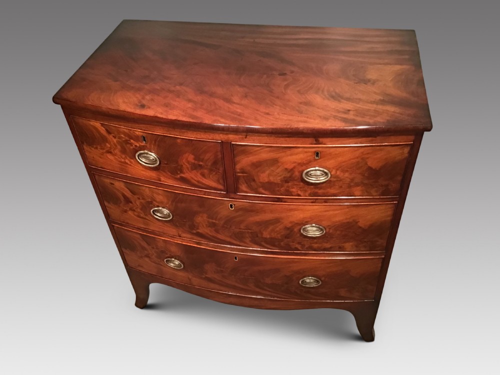 Antique bow front chest of drawers