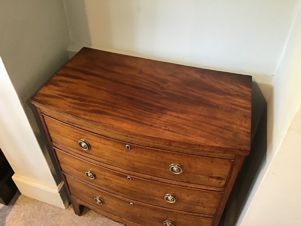 Antique bow front chest of drawers. View IV