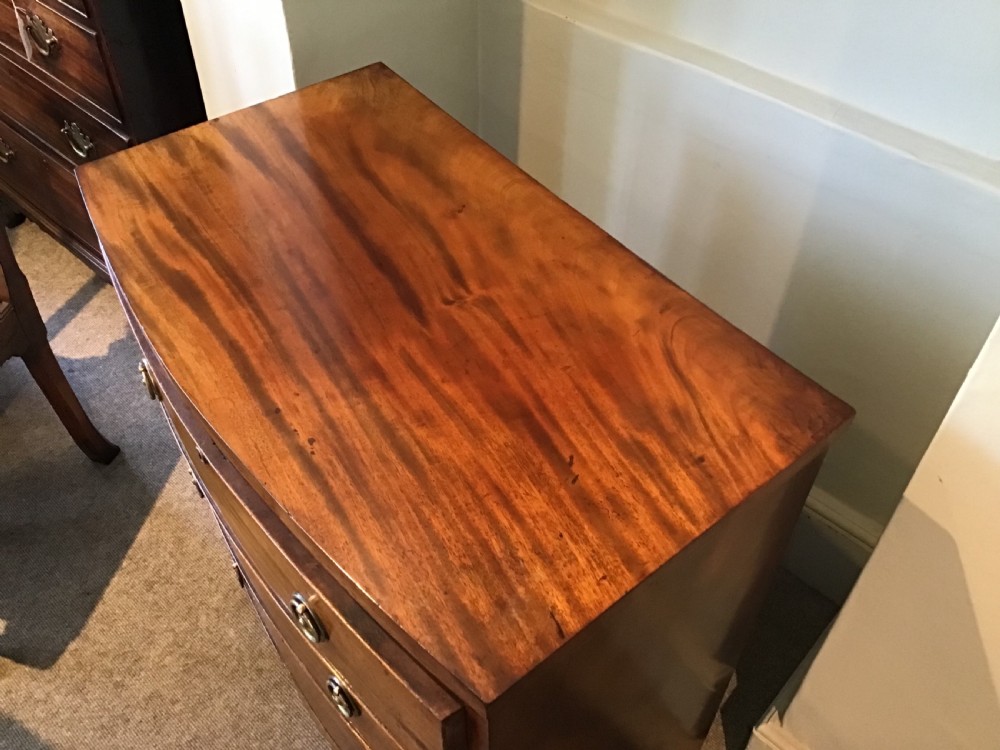 Antique bow front chest of drawers. View VI