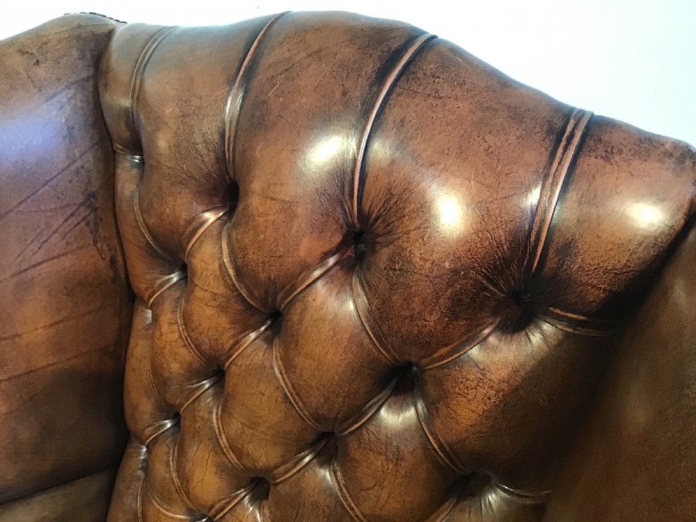 Antique leather wing chair View IX