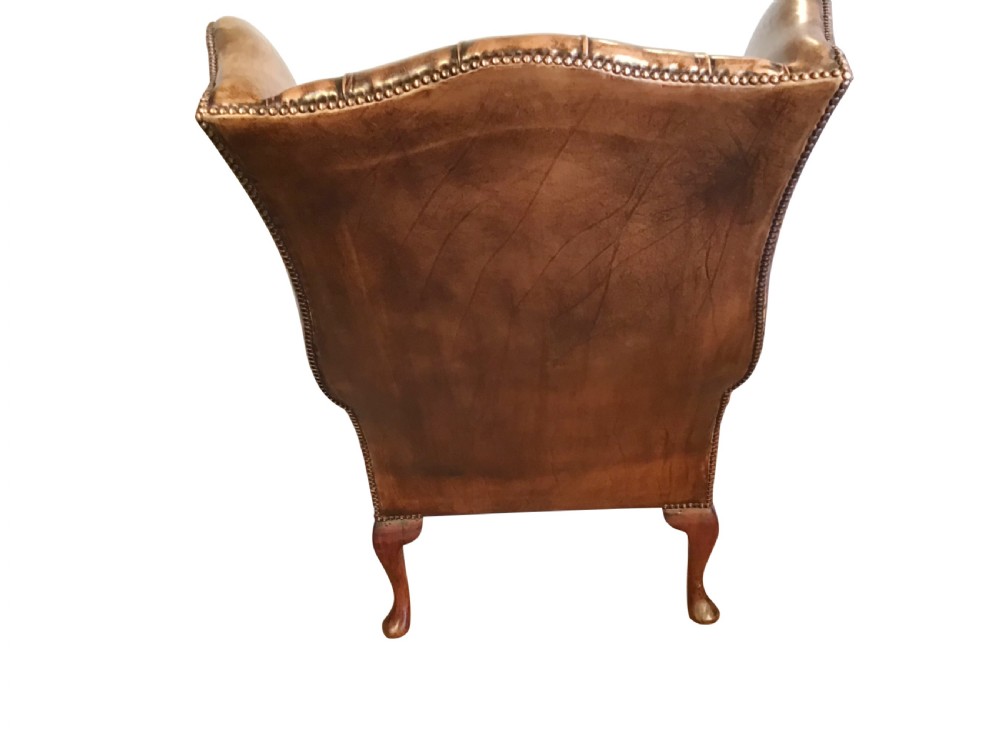 Antique leather wing chair View XI