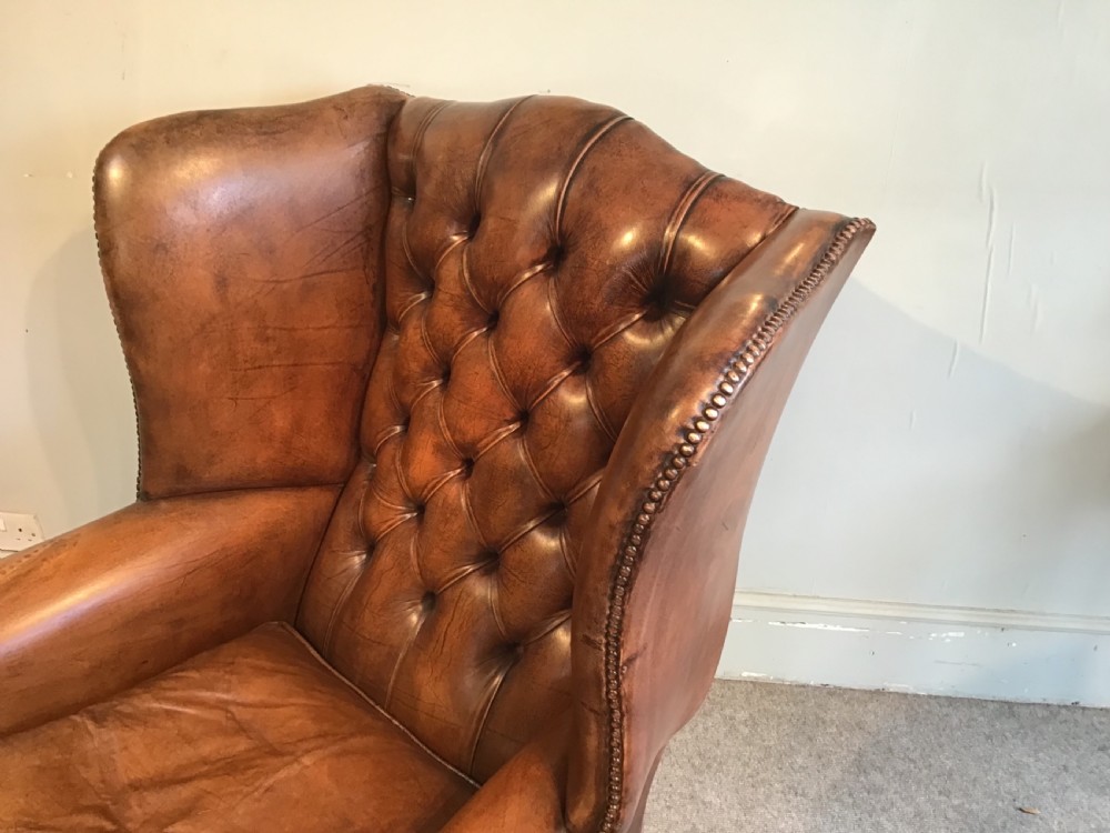 Antique leather wing chair View XII