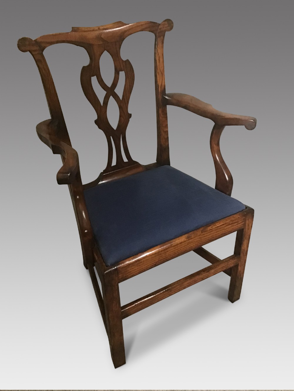 Antique elm elbow chair