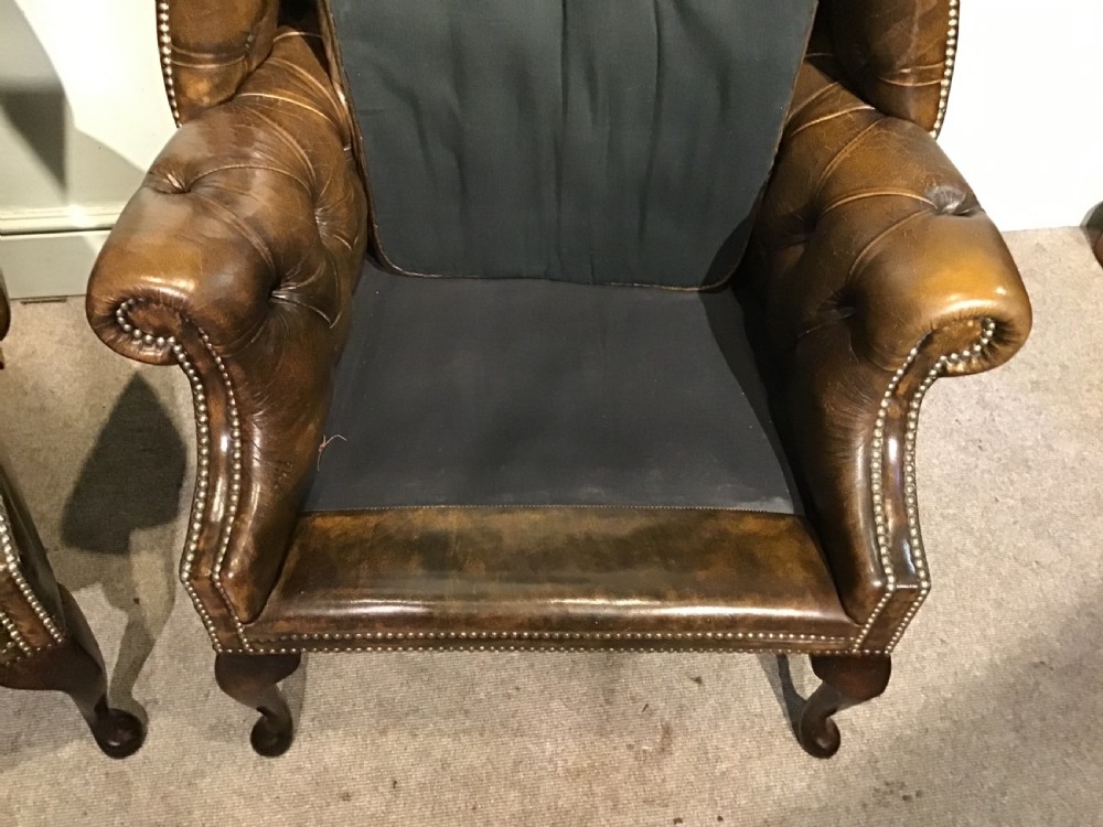 Pair of leather upholstered wing chairs View VIII