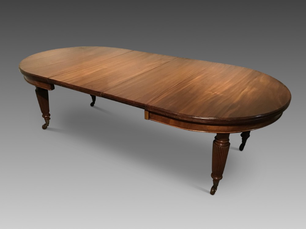 Antique extending dining table