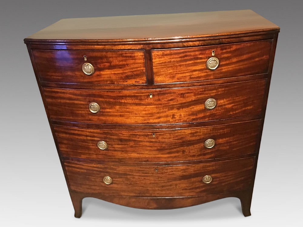 Antique bow front chest of drawers
