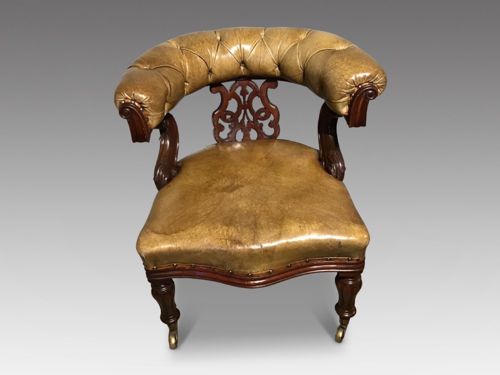 Antique mahogany and leather desk chair
