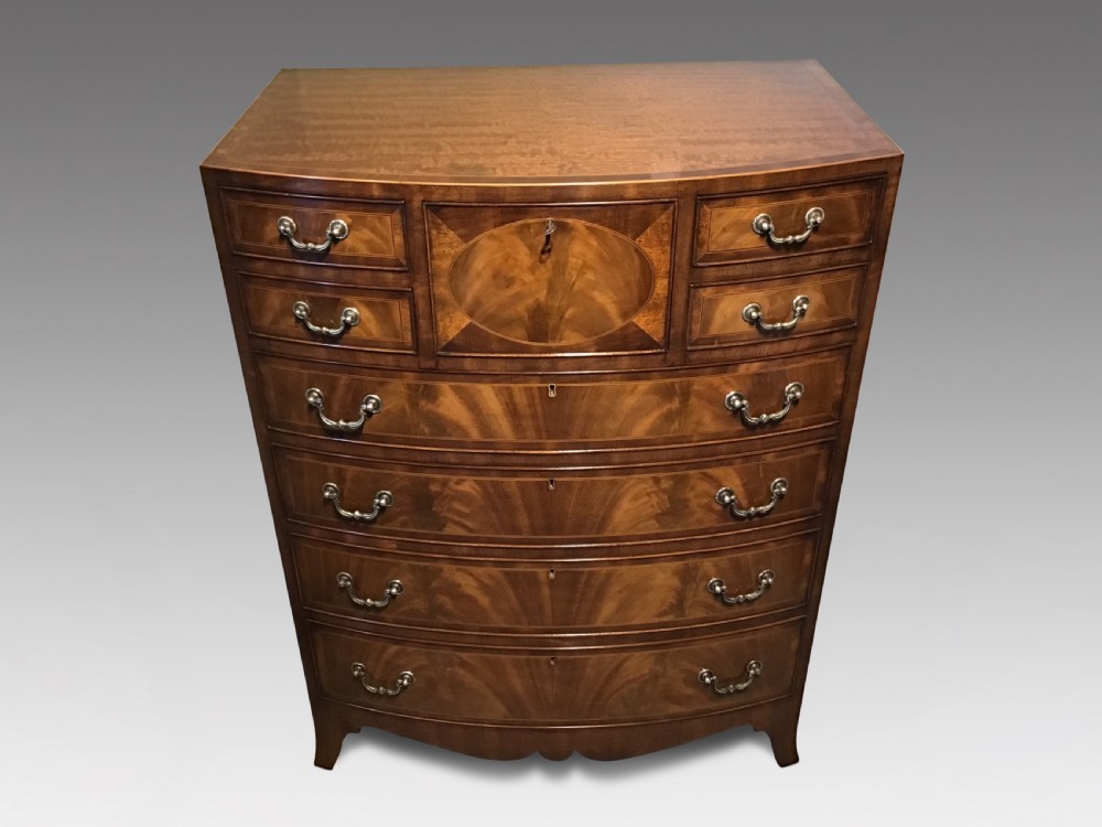 Antique bow front chest of drawers