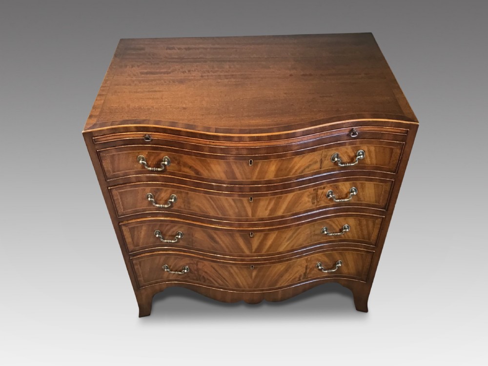 Antique serpentine chest of drawers View II